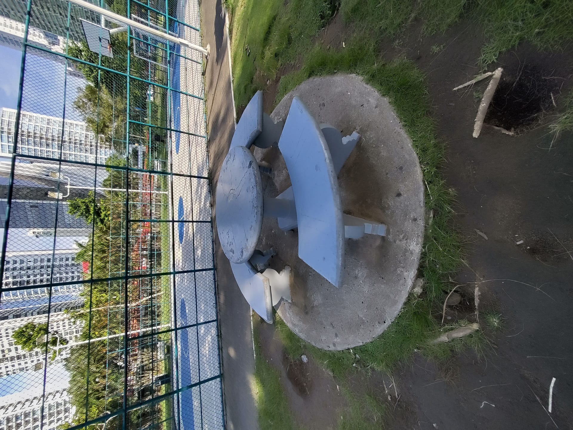 Picnic tables next to basketball courts